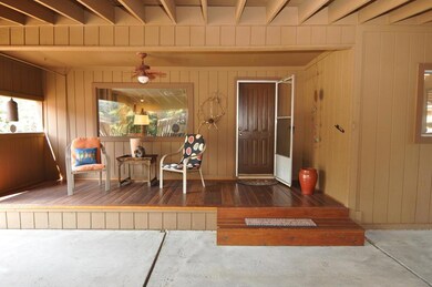Main entry off of east side carport.