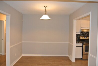 Another dining room view into kitchen.