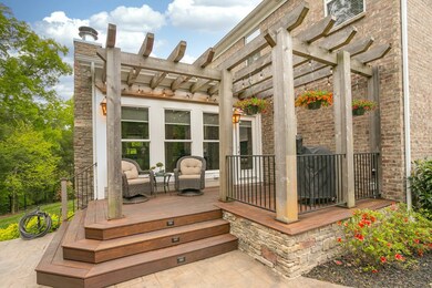 The Brazilian hardwood (Ipe) deck has lighted steps, a cedar pergola and a designated area for your grill(s).  There is even a natural gas tap built in for your convenience. 