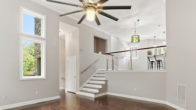 Level 2 open living, dining and kitchen