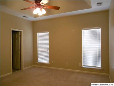 Master Bedroom features a trey ceiling & big walk-
