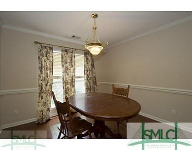 Dining Room. HARDWOODS, CHAIR RAILING AND CROWN MO