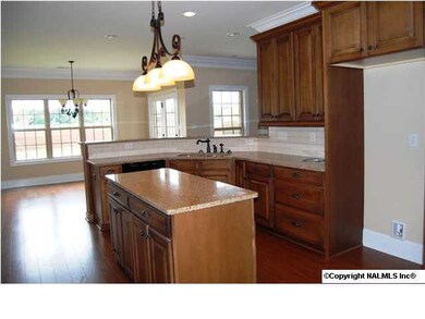 Kitchen with island. Chef's Dream Kitchen with tons of upgrades. ......similar picture