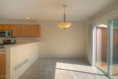 Living room open to dining room