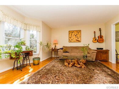 FAMILY ROOM W/ HARDWOOD FLOORS