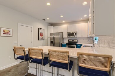 Dining space featuring finished concrete flooring