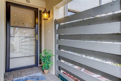 Covered Front Porch with Privacy Fence for Courtya