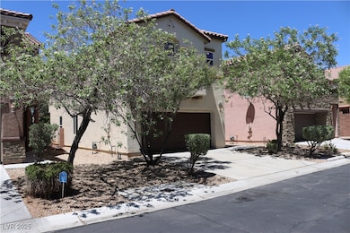 View of front of house featuring an attached garage, concrete driveway, a tiled roof, and stucco siding