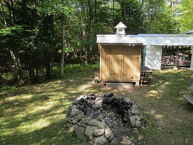 Storage. Huge fire pit with shed for...