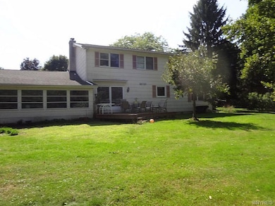 Exterior Back where you can see Florida room and d