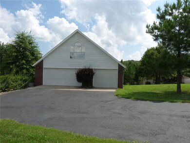 This over-sized garage is about 35' x 31' on the lower level and 31' x 21' upstairs.