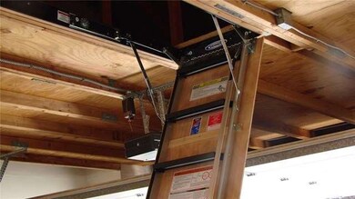 Check out the pull down stairs to storage in the a