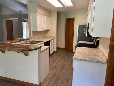 OPEN KITCHEN & NEW LAMINATE FLOORS