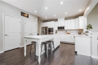 Kitchen features Stainless Appliances & Hardwood F