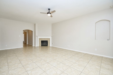Elegant living room with a cozy fireplace, abundan