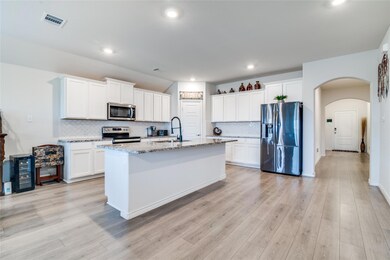 Granite Countertops & lots of cabinet & counter-to