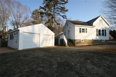 Detached 2 car garage, left side is...