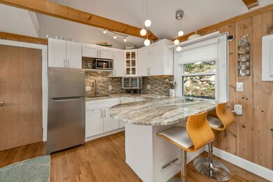 Gorgeous kitchen with granite, lighted cabinet, SS