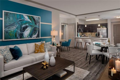 Living room with dark hardwood / wood-style floori