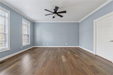 Spare room featuring hardwood / wood-style floors,