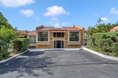 Raised ranch with uncovered parking, a standing s