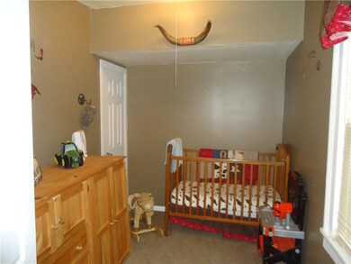 1st Bedroom located downstairs w deep closet .