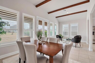 Dining area with baseboards, visible vents, light