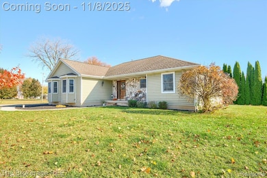 Ranch-style home with a front yard