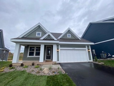 Charming Villa with lawn care and snow removal. Large Azek covered front porch.