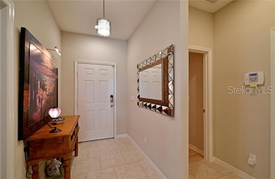 The entry foyer leads in to the open floor plan.