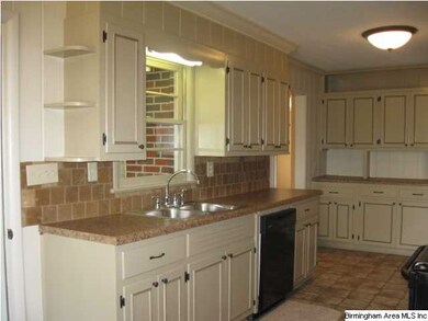 New sink and faucets and dishwasher.