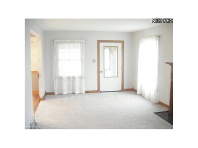 Living Room entry off of front Sun Room.