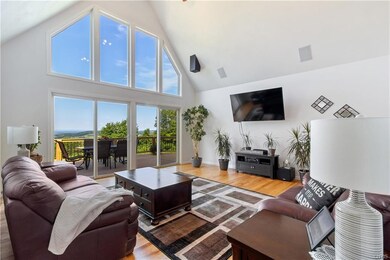 The great room features an 18' cathedral ceiling &