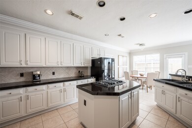 Enjoy cooking your meals with ample granite counte