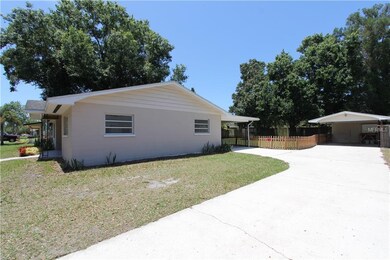 Extra long driveway that leads to the 2 car ports.