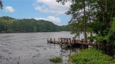 Waterfront lot with dock and boathouse