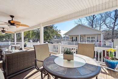 Wooden terrace featuring fence, outdoor lounge are