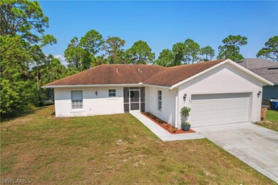 740 Oro Ave S, Lehigh Acres, FL 33974 - photo 2