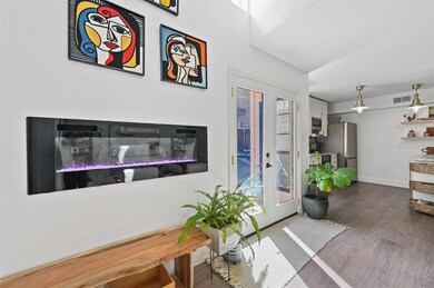 Entrance foyer featuring dark hardwood / wood-styl