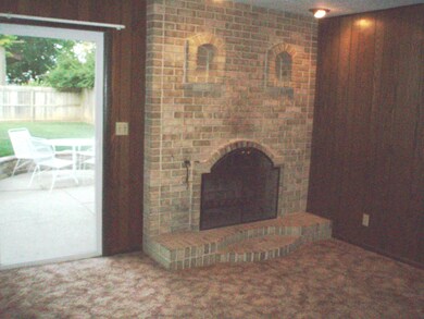 wood burning fireplace in family room