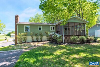 Rear view of the home showcasing a nice screened porch!