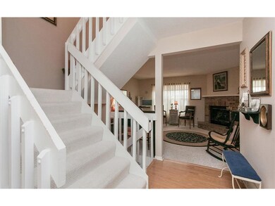 View from the front entry way of lively living roo