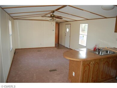 Kitchen - view from kitchen into living room and f