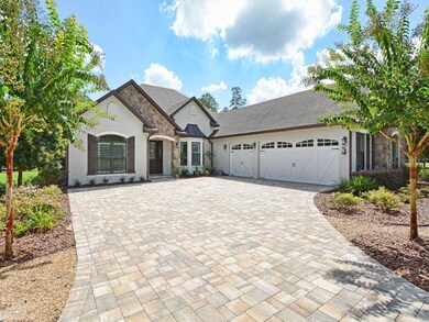 3 Car Garage and Brick Paver Driveway