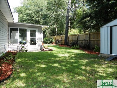 142 Crossing fenced back yard with storage shed