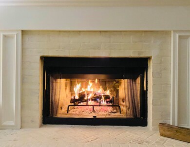 The lovely fireplace added in 2019 is actually woo