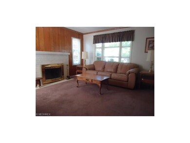 A big picture window & 2 corner windows bring in t