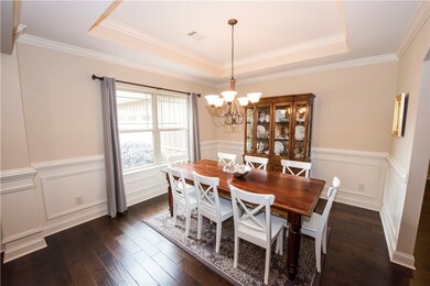Dining Room with Tray Ceiling & Picture Frame Moul