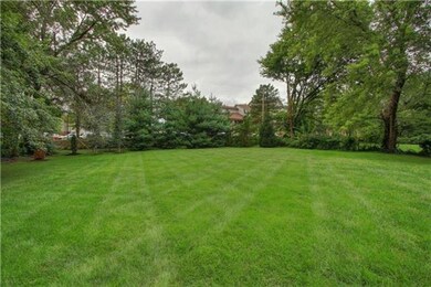 .66 Acre lot with manicured and fenced yard.  This