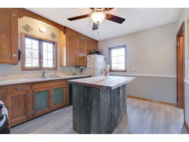 Spacious kitchen with new grouted vinyl flooring